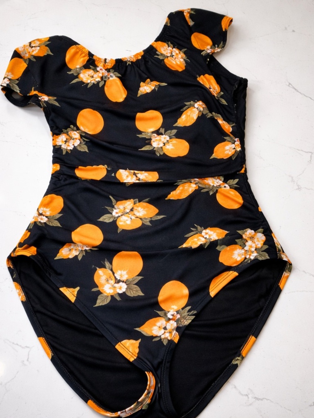 Black One-Piece Swimsuit with Orange Fruit & Floral Print